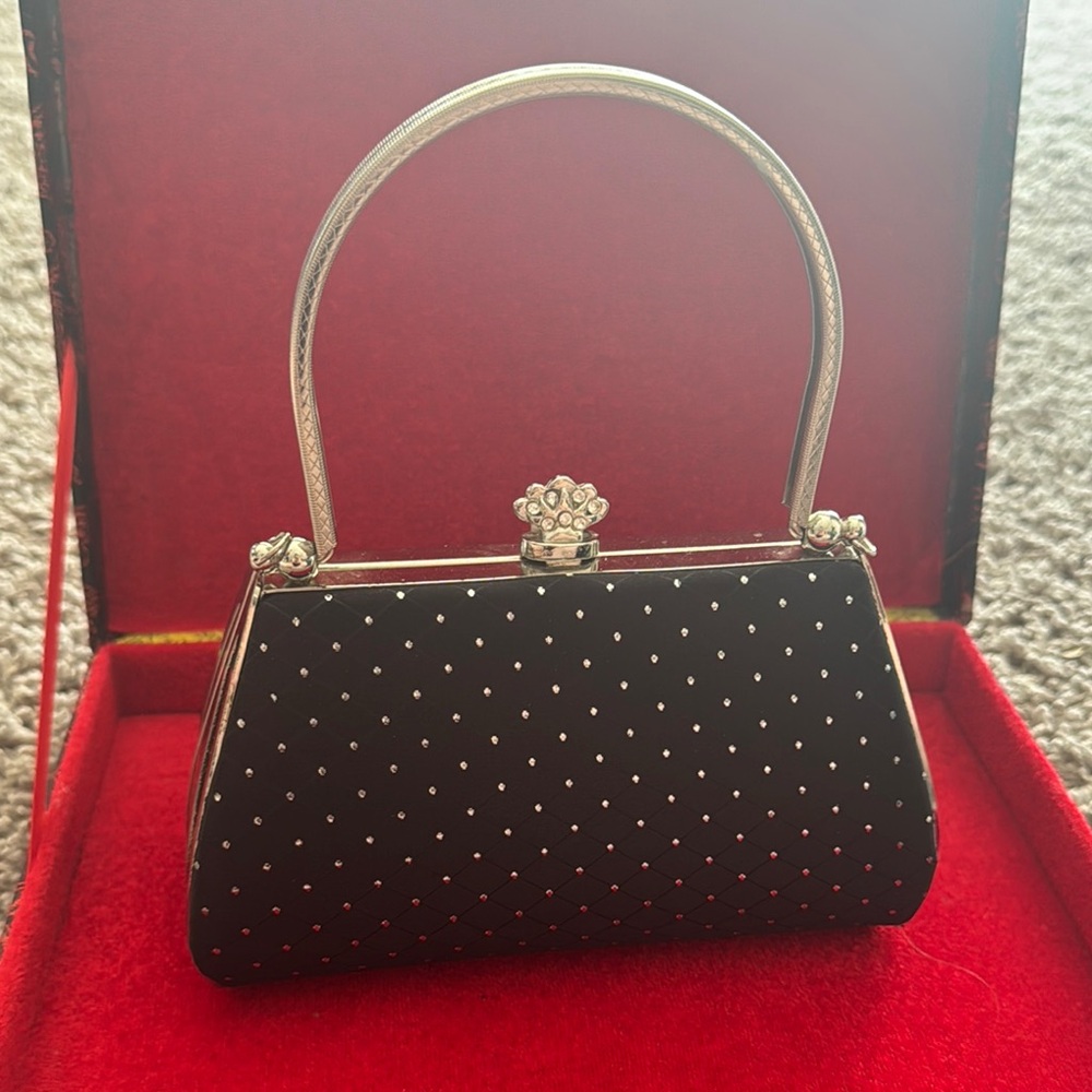 Elegant Black Handbag with Silver Accents